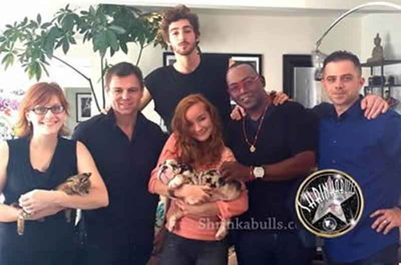 Shrinkabull's family and Blue Merle Miniature English Bulldog Puppy with Randy Jackson and family